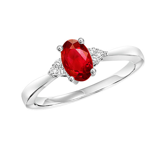 Oval-shaped Gemstone and Diamond Ring