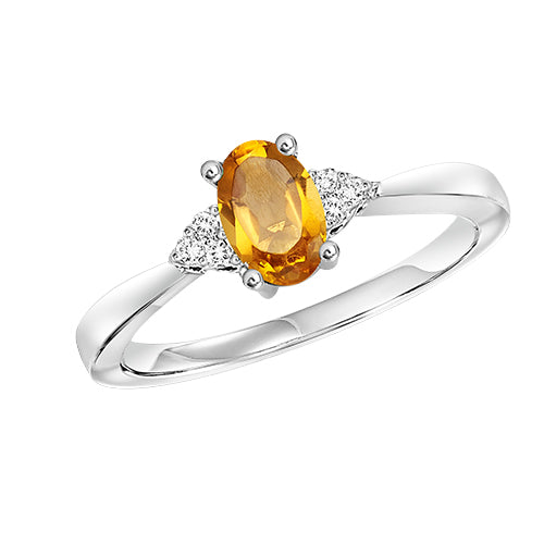 Oval-shaped Gemstone and Diamond Ring
