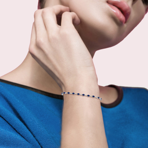 Oval Cut Sapphire and Round Cut Diamond Bracelet